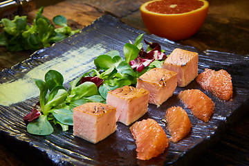 Image showing Slow Cooked Salmon fillet steak with salad on plate, Sous-Vide Cooking Salmon Fish