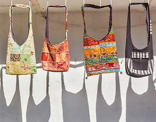 Image showing Handmade bags on sale for tourists in India