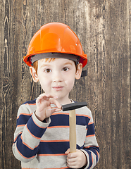 Image showing boy in orange helmet