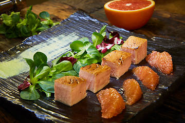 Image showing Slow Cooked Salmon fillet steak with salad on plate, Sous-Vide Cooking Salmon Fish