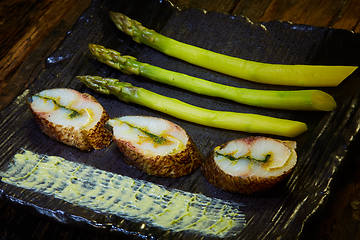 Image showing The fish fillet with green asparagus. Shallow dof.