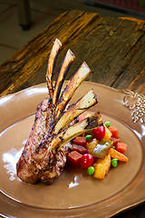 Image showing Lamb rack with limoncello glaze served on a plate