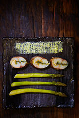 Image showing The fish fillet with green asparagus. Shallow dof.