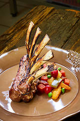 Image showing Lamb rack with limoncello glaze served on a plate