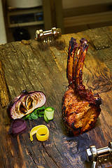Image showing Lamb rack with limoncello glaze served on a plate