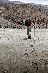 Image showing Mountaineer trekker walking in Himalayas