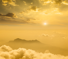 Image showing Mountains in cloud on sunset