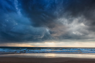 Image showing Gathering storm on beach