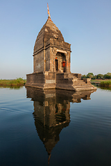 Image showing Small Hindu temple in the middle of the holy Narmada River, Maheshwar, Madhya Pradesh state, India