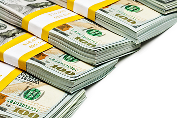 Image showing Bundles of 100 US dollars 2013 banknotes bills