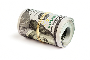 Image showing Roll of hundred dollar bills isolated