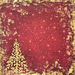 Image showing Christmas Tree Glitter Decoration on Grunge Red Gold Background