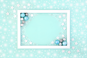 Image showing Abstract Christmas Blue Background with Stars Snow and Decoratio