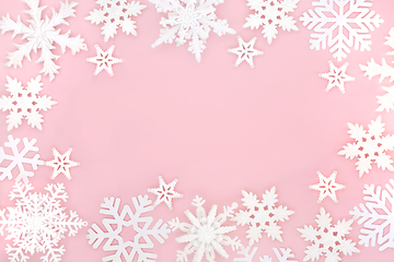 Image showing Festive Christmas Magical Ornate Snowflake Pink Background