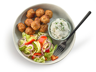 Image showing plate of meat balls and vegetable salad