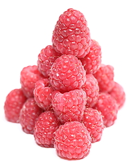 Image showing The pyramid of ripe raspberry over white background