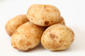 Image showing A lot of raw potato on white background.