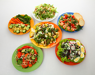 Image showing set with different salads on white background