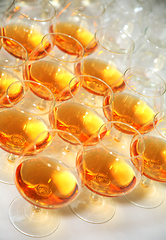 Image showing Beautiful rows of glasses of whiskey or cognac