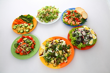 Image showing set with different salads on white background