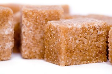 Image showing Brown sugar cubes. on white background