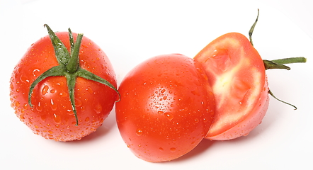 Image showing Fresh organic tomatoes on white background. Top view