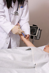 Image showing Administering to patient