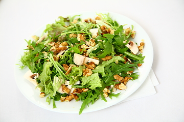 Image showing Salad with nuts, mushrooms and herbs