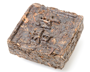 Image showing Aromatic black pu-erh tea from yunnan province in China. Leaves undergoes double fermentation and compressed into bricks. Healthy drink.