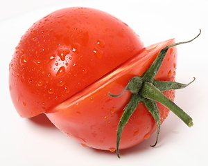 Image showing Fresh organic tomato on white background. Top view