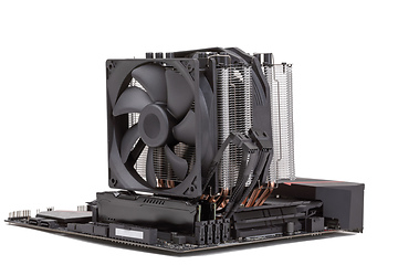 Image showing PC mainboard with CPU cooler on white