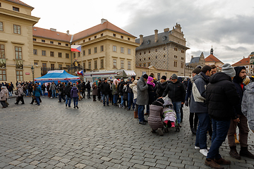 Image showing Tourists queue in front of the Prague Castle