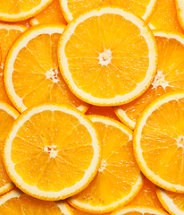 Image showing Colorful orange fruit slices