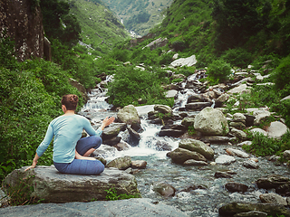 Image showing Woman doing Ashtanga Vinyasa Yoga asana Marichyasana D