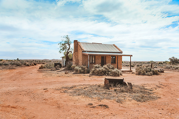 Image showing Old stone cottage baking in the hot Australian sun