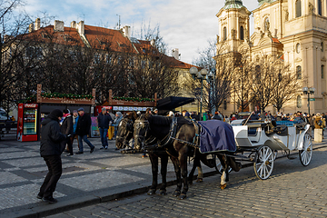 Image showing horse carriage waiting for tourists on Christmas Old Town Square