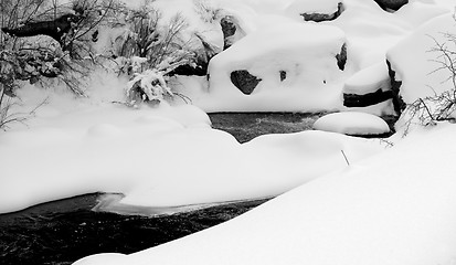 Image showing Snow Drifts on a Mountain River