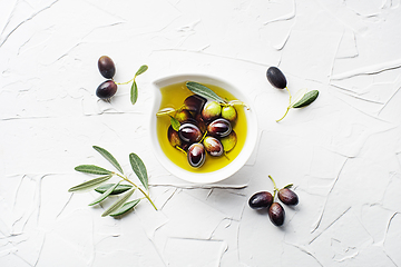 Image showing Olive oil bowl background