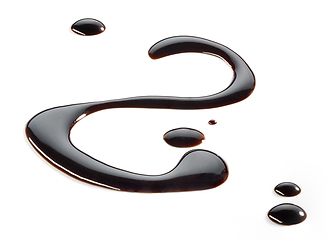 Image showing dark chocolate sauce on white background