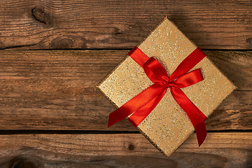 Image showing Gift box with red ribbon