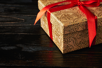 Image showing Gift box with red ribbon