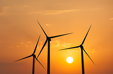 Image showing Wind generator turbines in sky