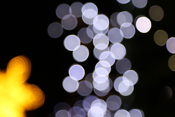 Image showing Lights of bulbs, abstract holiday background out of focus