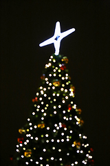 Image showing Christmas tree, unfocused holiday abstract background