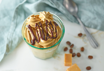 Image showing glass of whipped coffee and caramel mousse cream