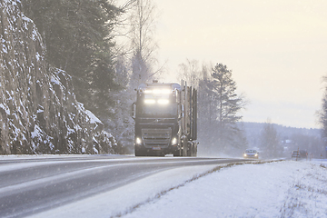 Image showing Volvo FH Timber Truck Headlights in Winter Snowfall