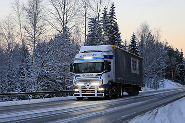 Image showing Scania Truck L Retva With Bright Headlights Pulls Semi Trailer 