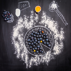 Image showing Baking concept - ingredients for blueberry pie, sprinkled wheat flour circle