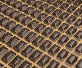 Image showing Many rows with brown sachets