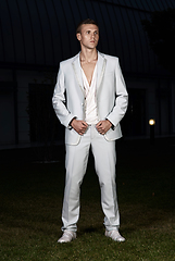 Image showing Fashion style photo of a man wearing white suit
